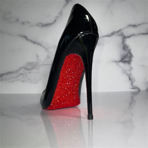 high heels with red bottoms.